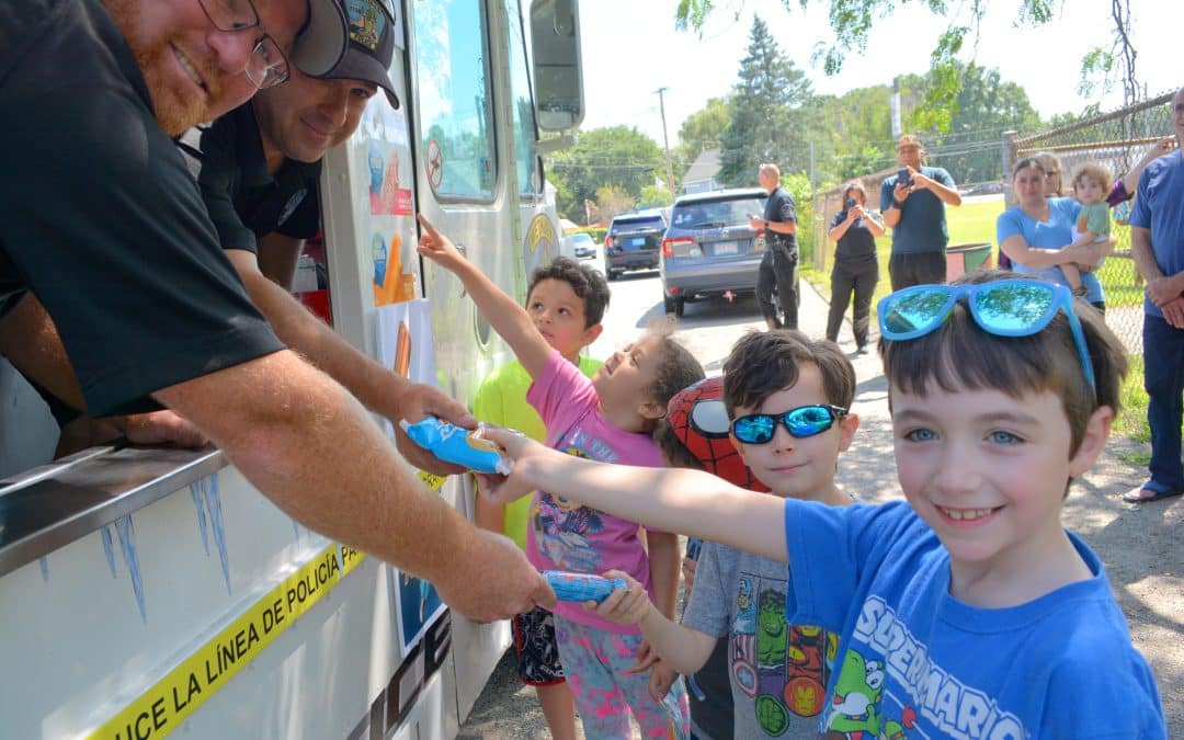 Cops cruise city in ice-cream truck handing out frozen treats