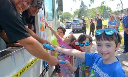 Cops cruise city in ice-cream truck handing out frozen treats