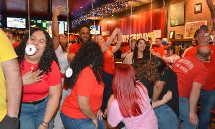 Pickle-juice drinking & donut chomping raise nearly $3K for MAN Inc.
