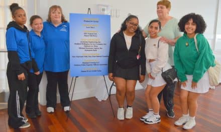 Golfers swing away  to help the kids at MAN Inc.