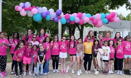 Crowd cheers as Girls on the Run races around Tenney