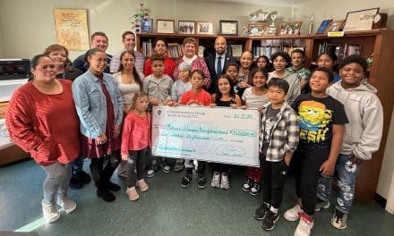 Grateful MAN Inc. accepts $150,000 check from state