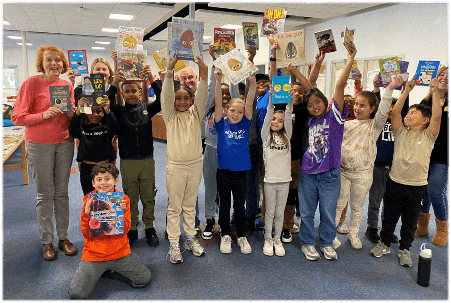 First Church donates 300 books to Timony readers!