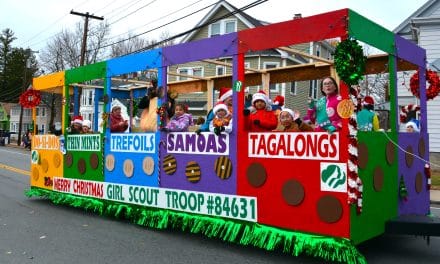 Santa & friends parade through town!