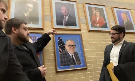 Perry portrait unveiled at City Hall mayoral wall