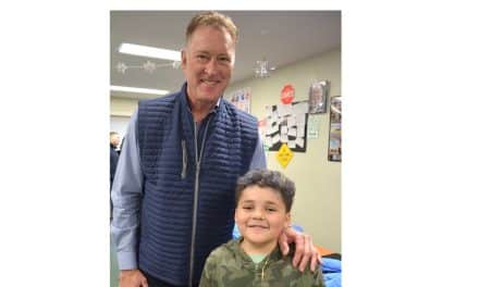 Bruins & firefighters fit 50 kids with new winter coats
