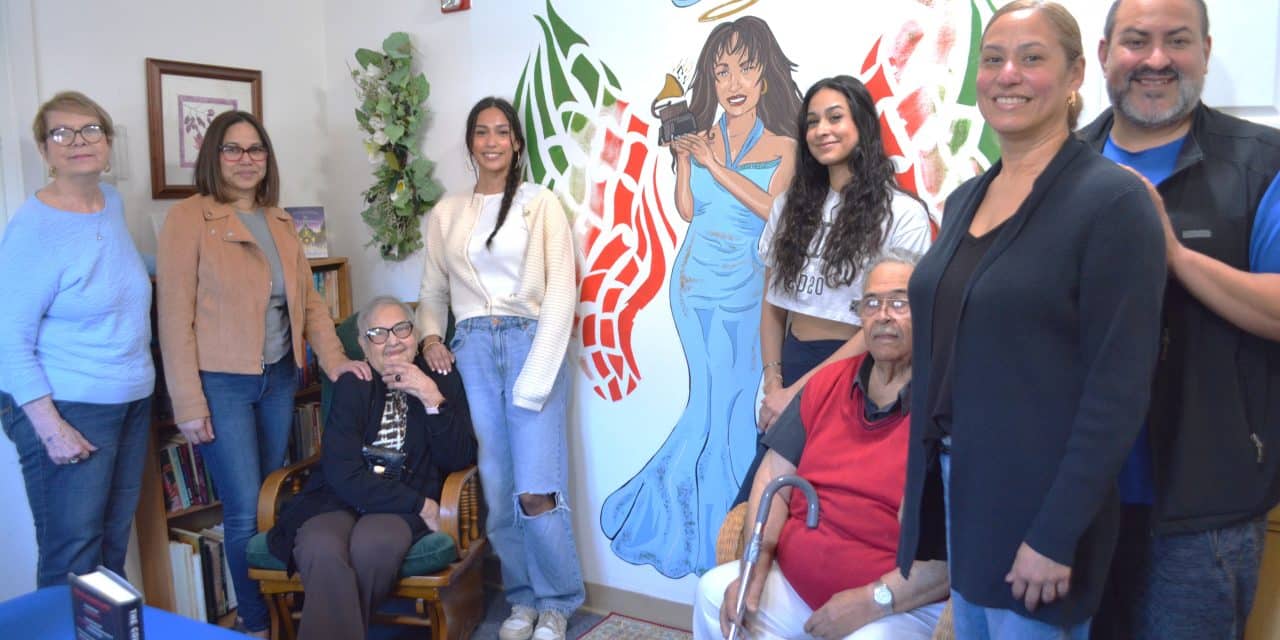 Teen’s mural unveiled at Housing’s renovated library