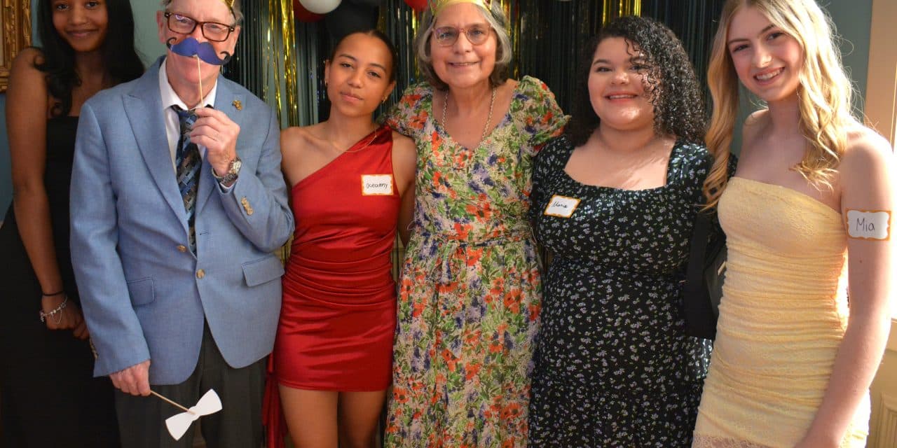 Teens & seniors pose & party at Intergenerational Prom!