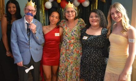 Teens & seniors pose & party at Intergenerational Prom!
