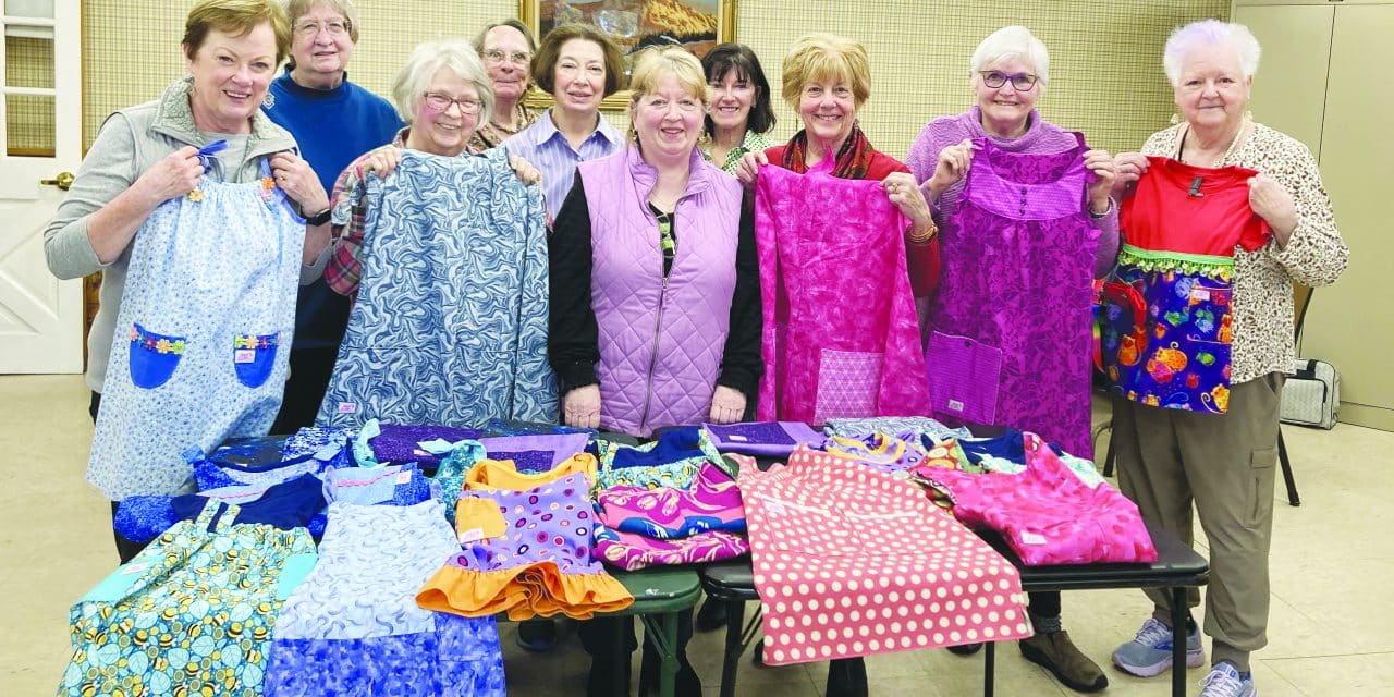 Day Stitchers craft dresses for at-risk girls
