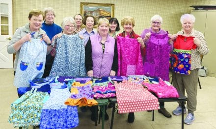 Day Stitchers craft dresses for at-risk girls