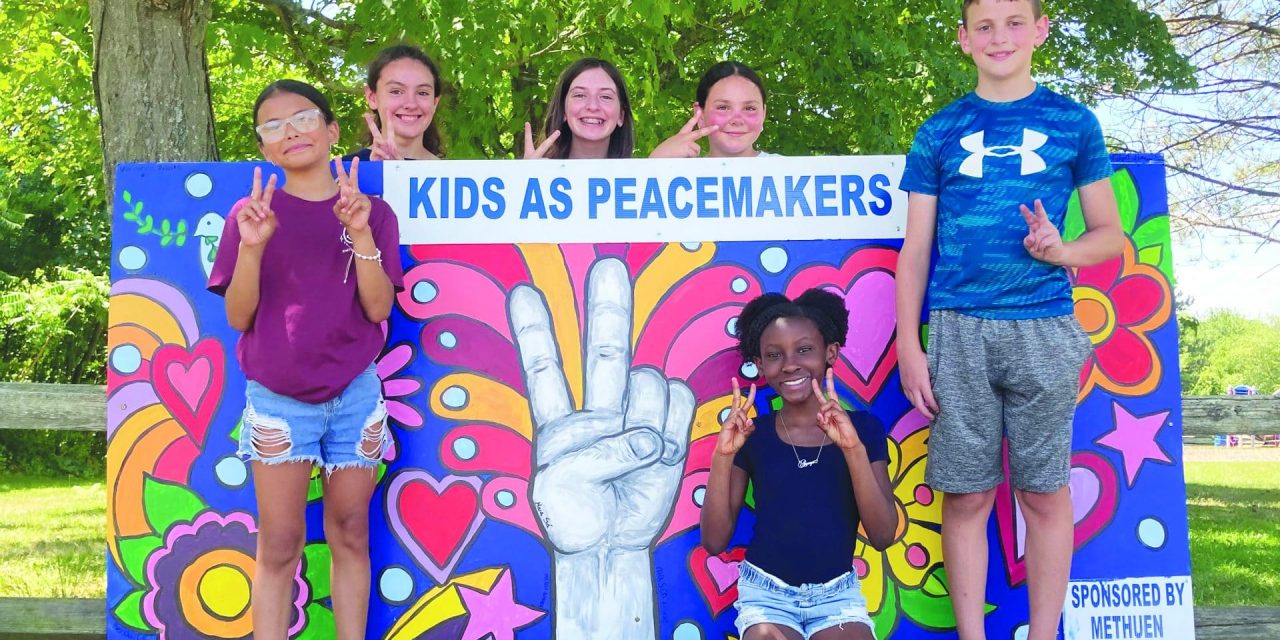 Kids’ messages of PEACE go up across city