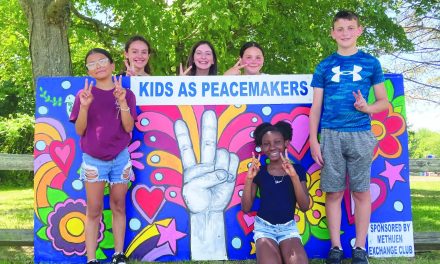 Kids’ messages of PEACE go up across city