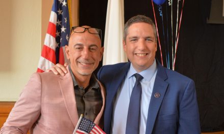 Persistence pays off! 48 new US citizens take oath at library