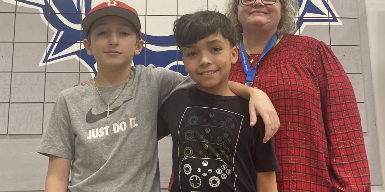 Choking 5th-grader is saved by his bestie & their teacher