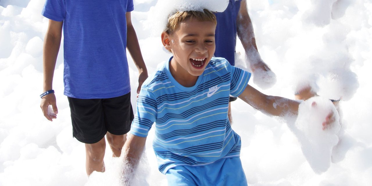 Y kids soak up the foam zone!