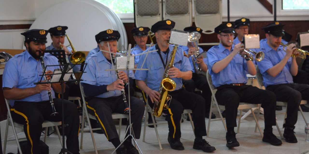 Crowd heads inside for Memorial Day observances